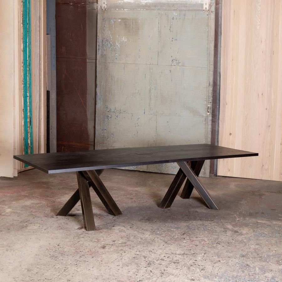 dark criss-cross leg dining table